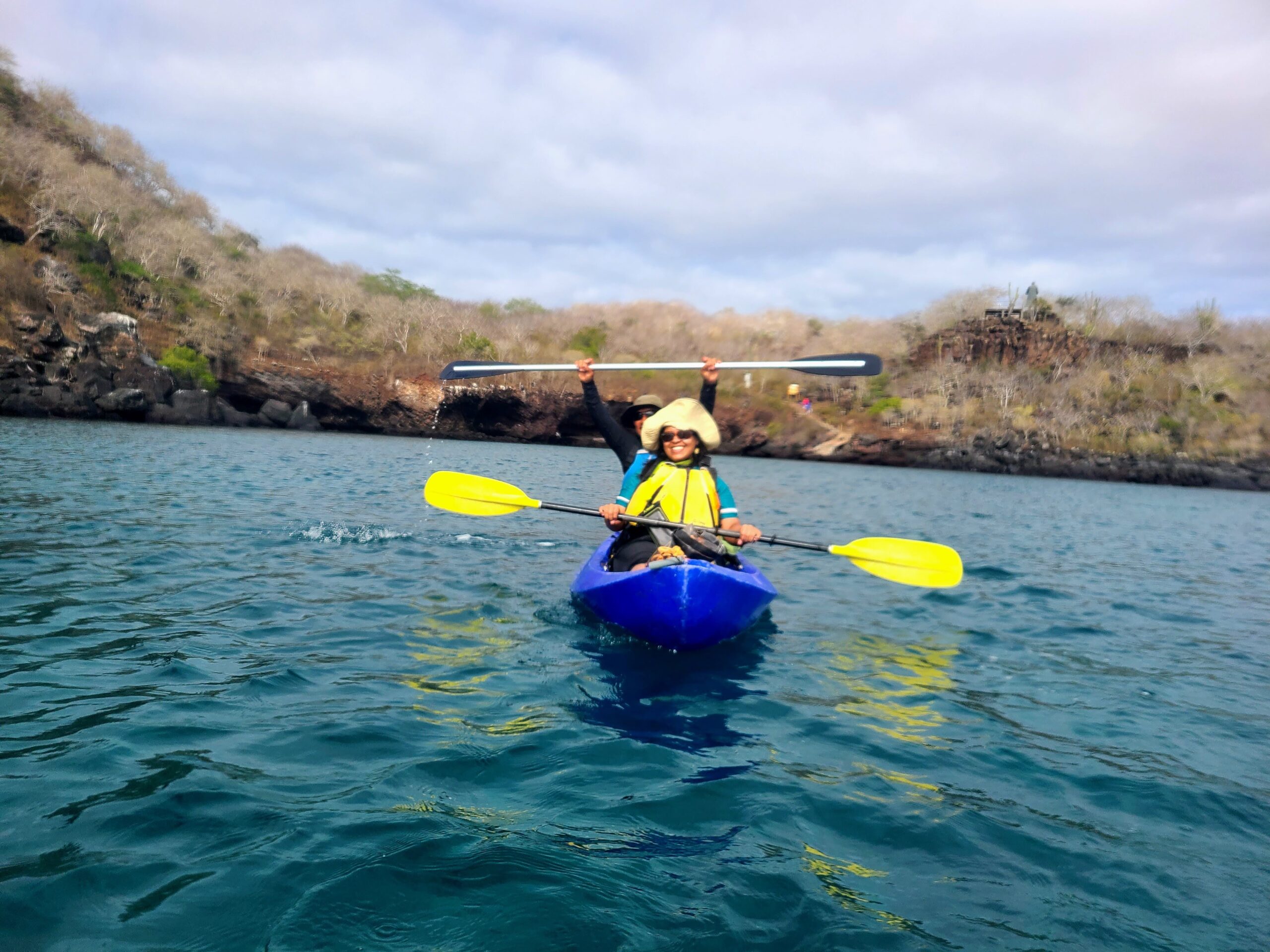 man and woman on a kayak