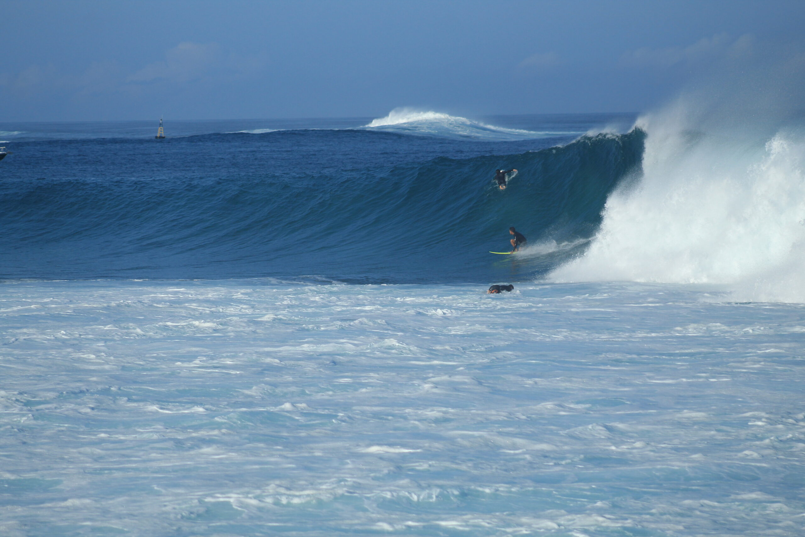 surfing a big wave at Punta Carola, San Cristobal, Galapagos