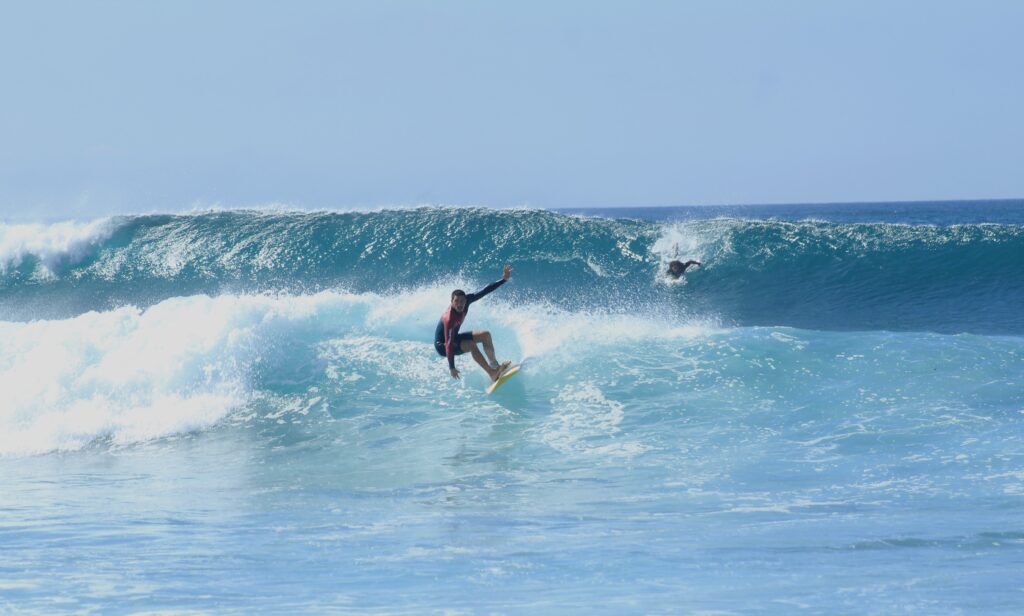 surfers at El Canon San Cristobal Galapagos