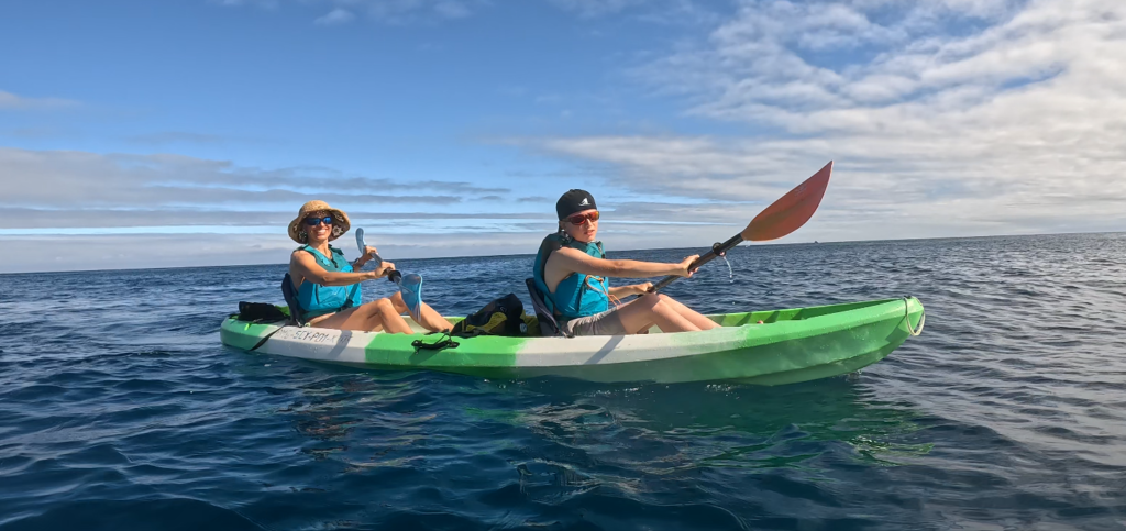 mother and son kayaking San Cristobal Galapagos