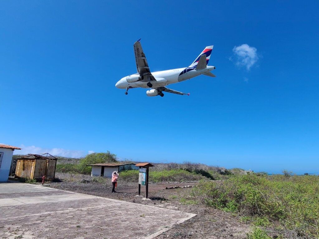 LATAM plane landing at SCY San Cristobal airport Galapagos