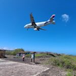 LATAM plane landing at SCY San Cristobal airport Galapagos